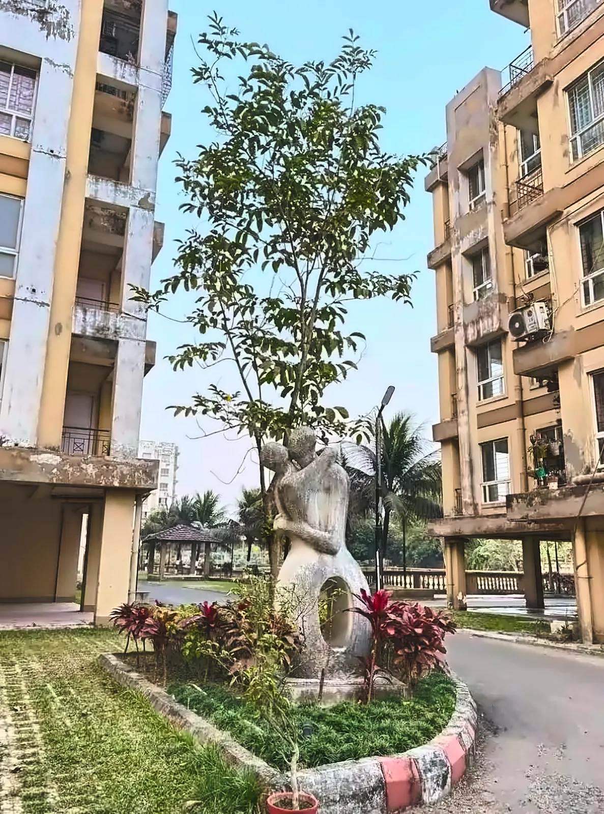 Between the towers — Art and greenery at every turn.